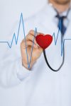 Doctor,With,Stethoscope,Listening,Heart,Beat,On,Virtual,Screen